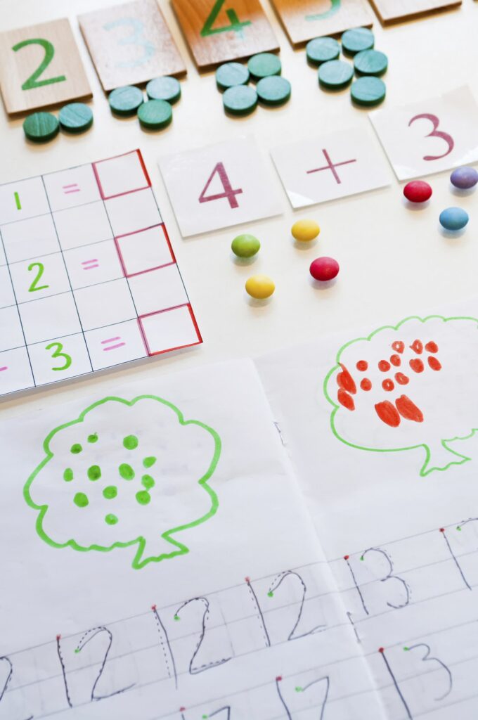 Math learning activity for kids with numbers and tiles
